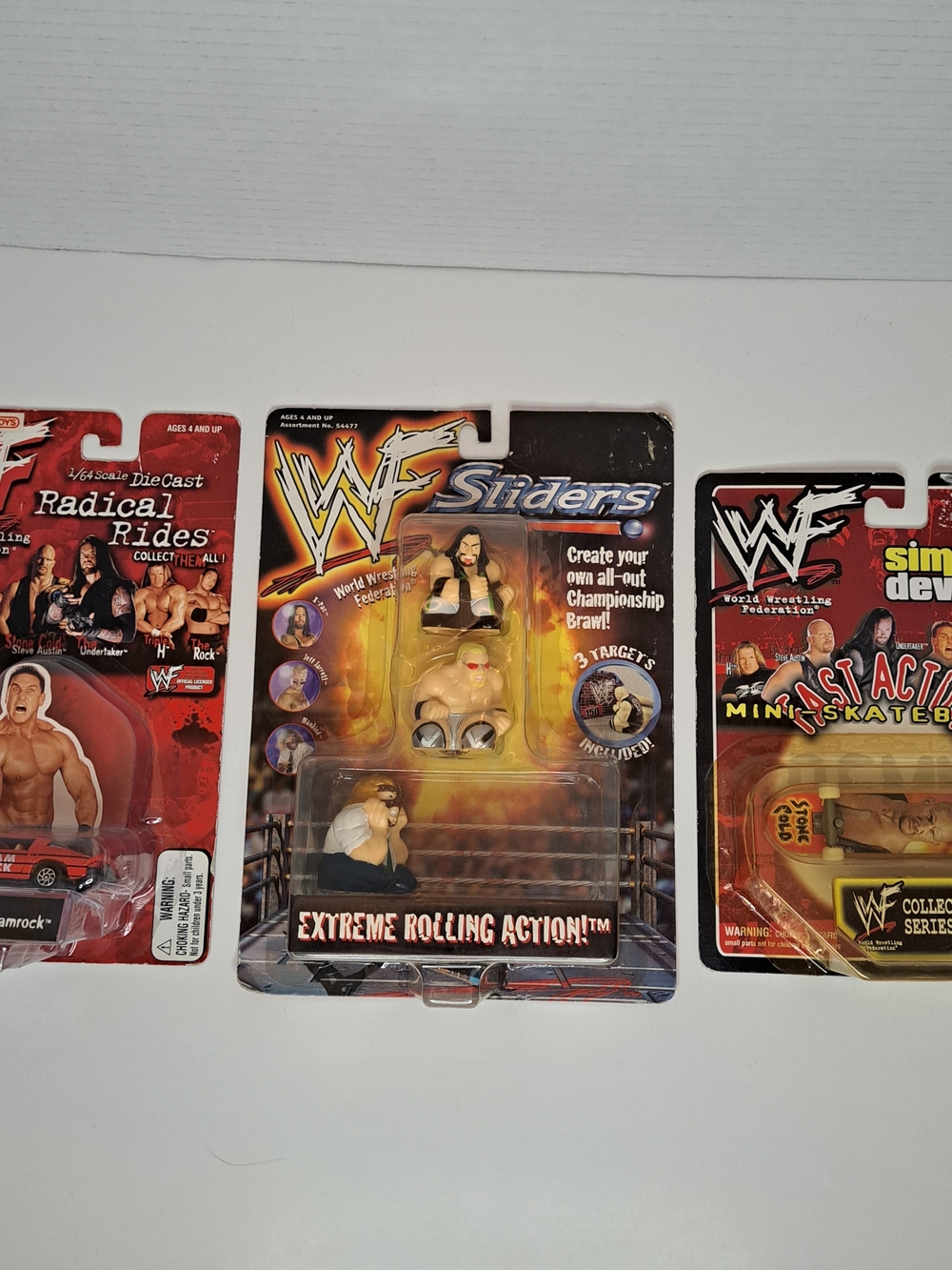 WWF Lot of 3 Items, Sliders, Skateboard, & Radical Rides (Ken shamrock) NIB
